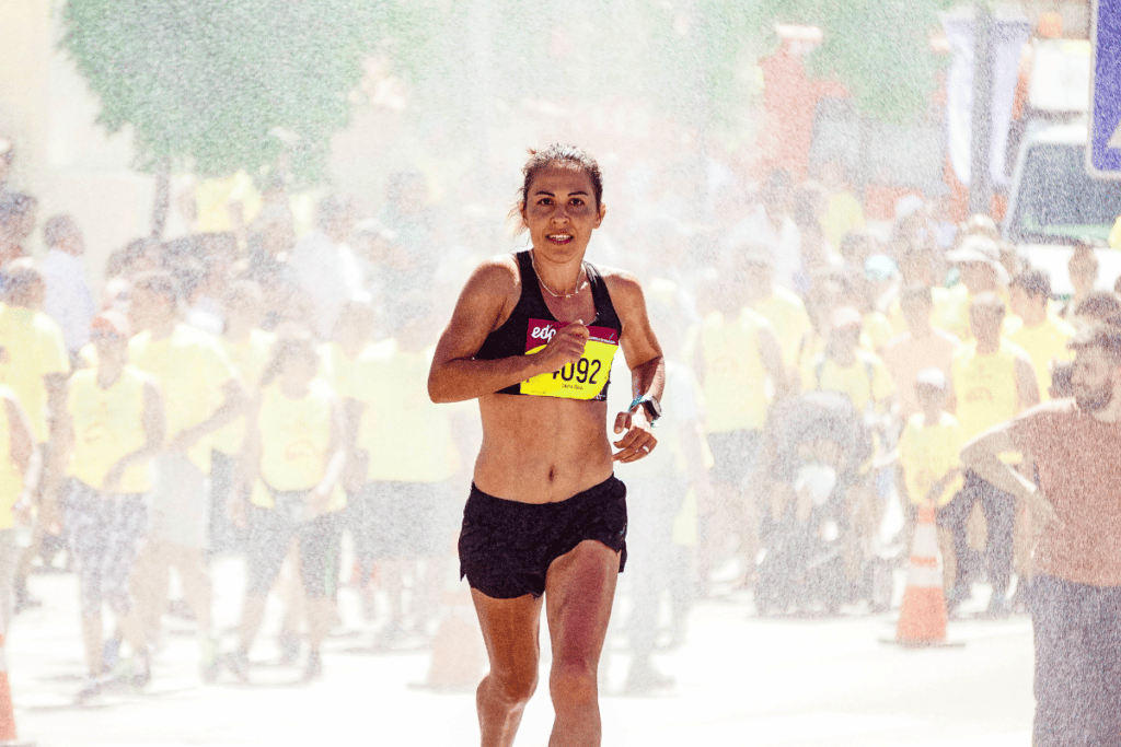 lean woman running a race