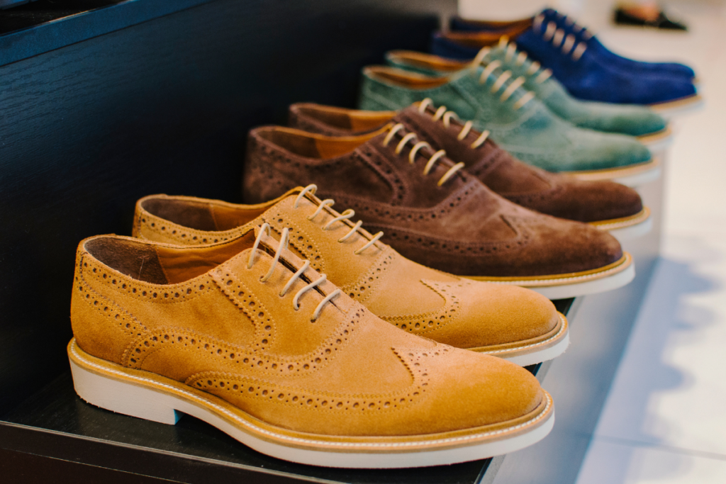 Instead of pairing stiff wingtips with your slacks, try going casual with your shoes - but you may have to wear a nicer top or tie to balance out the look!